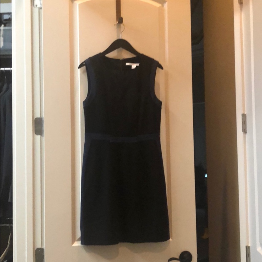 Black business dress with navy accents